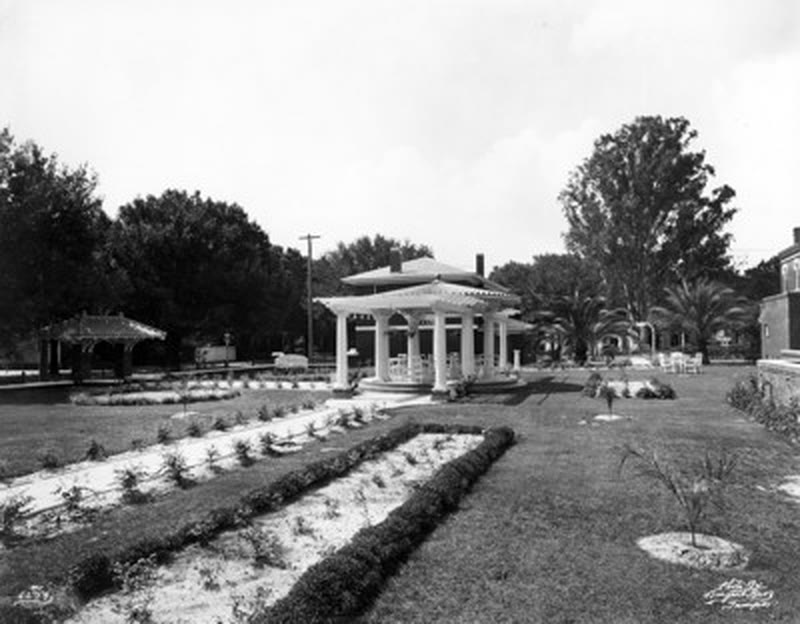 Formal gardens and a columned garden house at a grand South Tampa estate, 1921.